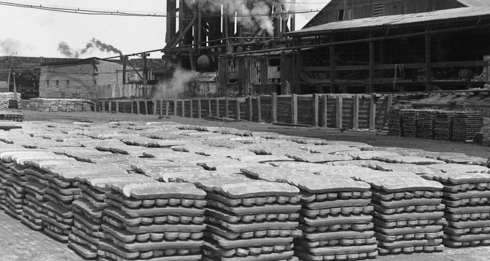 Stacks of lead ingots in a smelter yard at Port Pirie, South Australia, around 1925